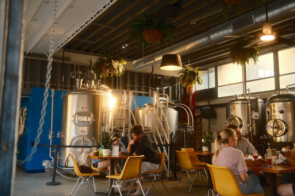 Guests sharing a drink at Demo Brewing